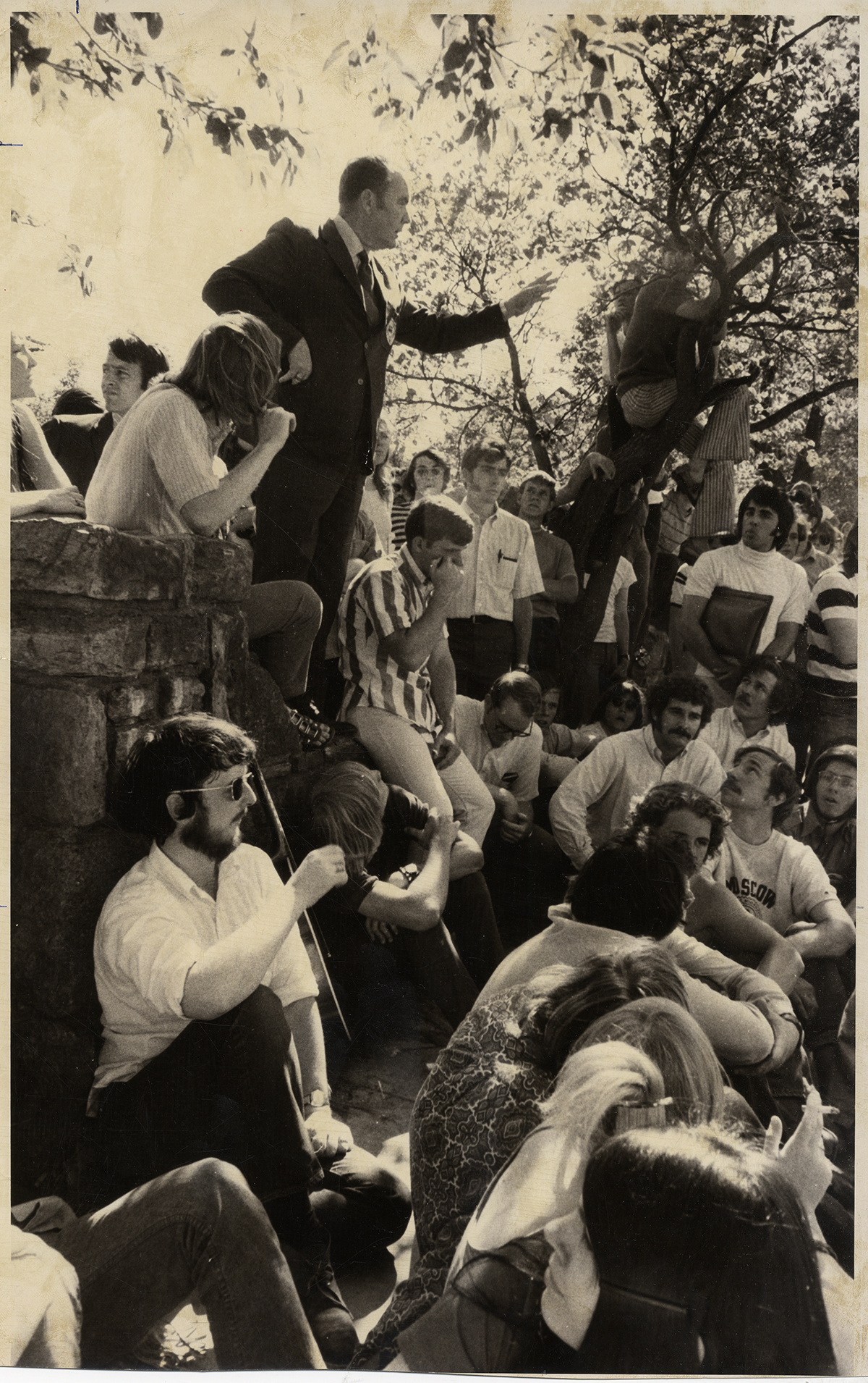 Copy of fig 12.14 OU Campus Security Chief Bill Jones talking with a group of students 1971 copy
