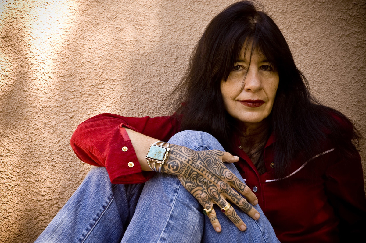 Copy of fig 16.8 J Harjo Photo with red shirt and hand copy